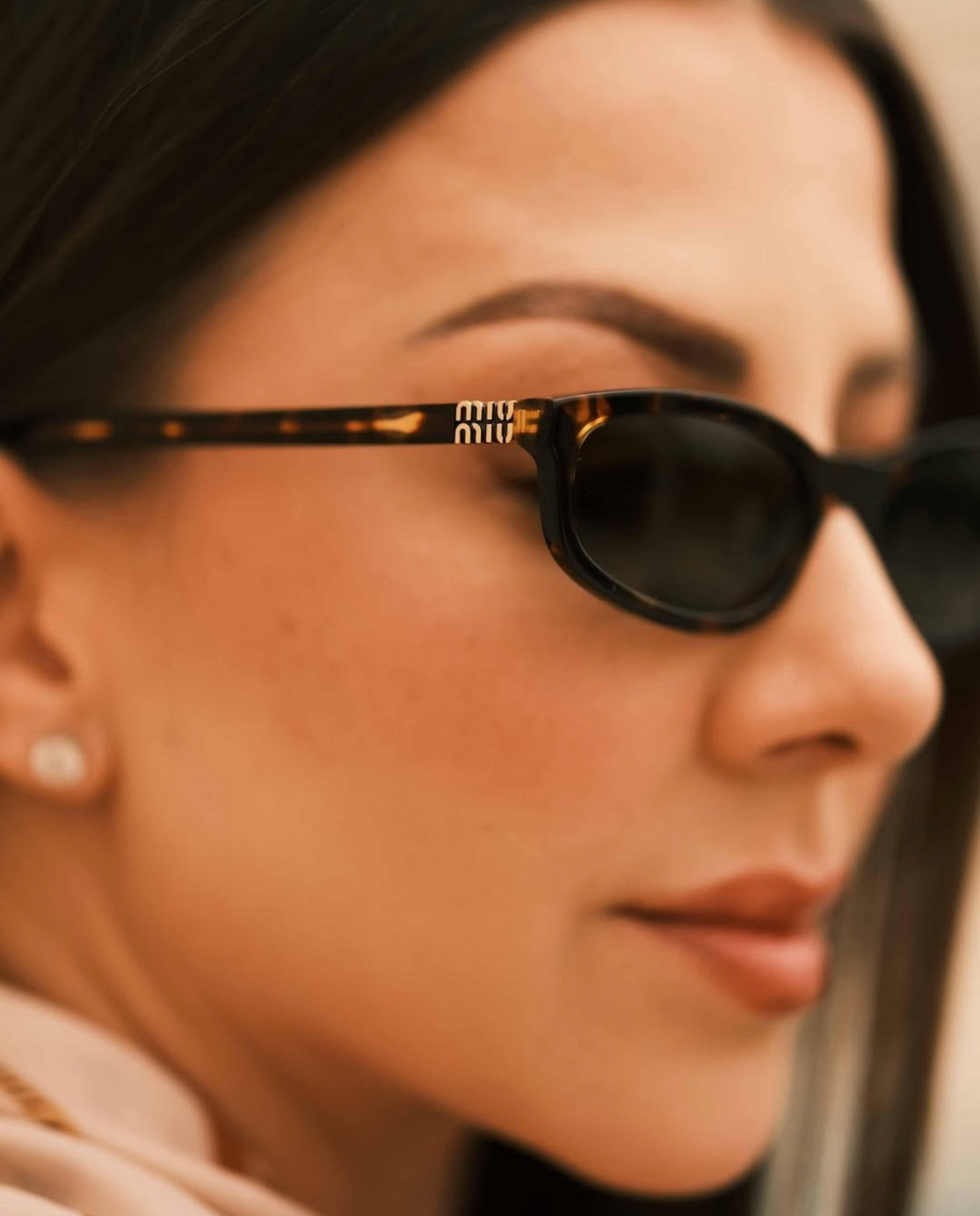 Miu Miu MU A06S