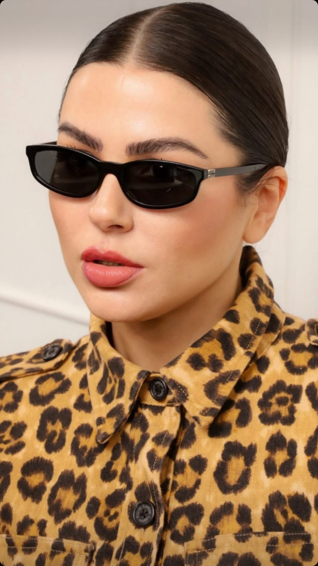 MIU MIU 0MU A06S 14L4I0