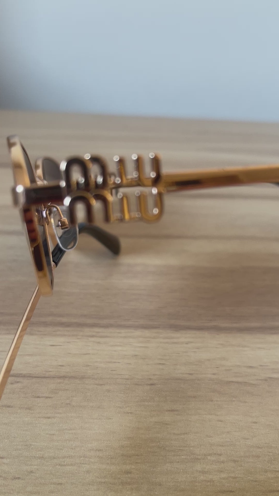 Miu Miu Logo oval-frame